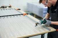 //jlrorwxhpjinlo5p.ldycdn.com/cloud/poBpiKnllqSRplnjkmimip/Professional-Cutting-Of-Corrugated-Plastic-Roofing.jpg